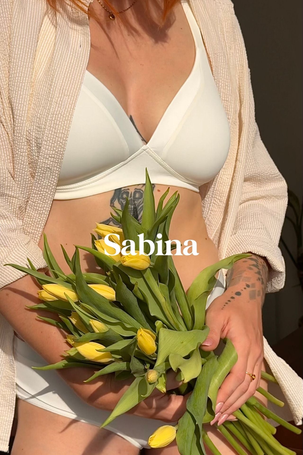 Photo of model called Sabina wearing the new Wireless soft bra with padded cups and briefs set in Ecru by Naturana